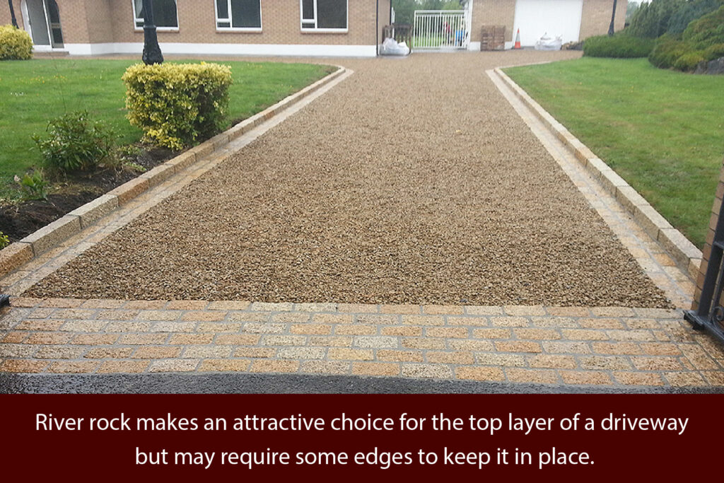 river rock makes an attractive choice for the top layer of a driveway
